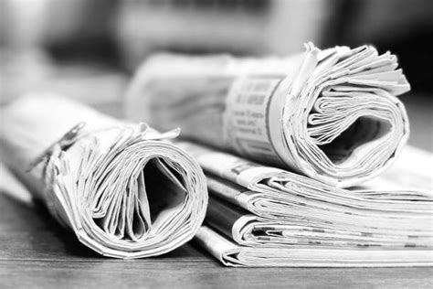 970 Folded Newspaper On Table Stock Photos Pictures And Royalty Free