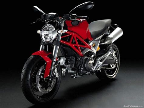 The ducati monster has a seating height of 785 mm and kerb weight of 209 kg. Ducati Monster wallpaper