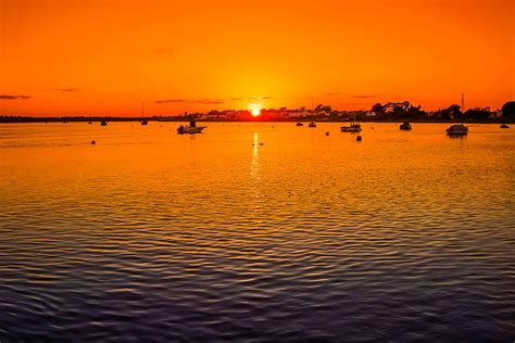 Sunset Over The Waters With Boats At Christchurch England Image Free