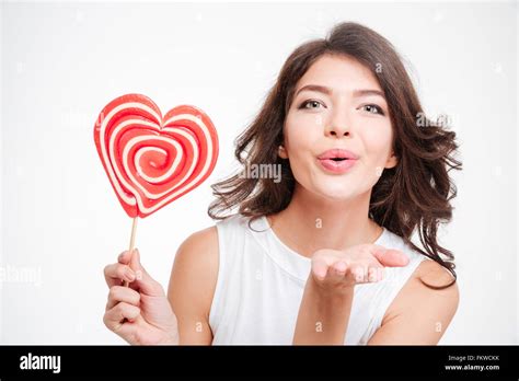 Portrait Brunette Woman Blowing Kiss Hi Res Stock Photography And