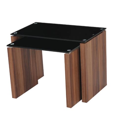 Some of the most different shapes and sizes that will let you only admire them for their difference with the rest of the crowd. Atlanta Black Glass Nest of Tables in Walnut Finish Leg