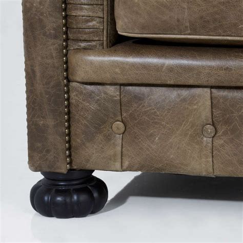 Purveyors of quality furniture, accessories, and artwork. Large custom Chesterfield sofa in olive green leather at ...