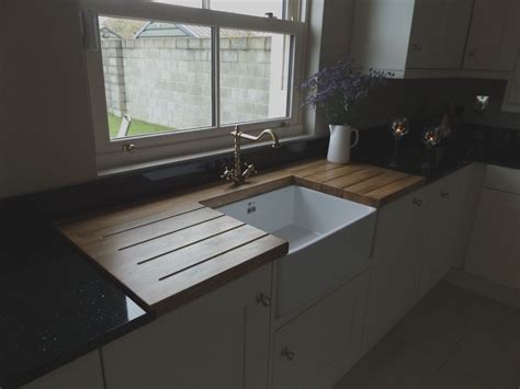 Dishwashers have replaced most of our manual washing. Solid Oak surround at Belfast Sink by Newhaven Kitchens ...