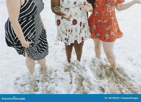 Curvy Women Dancing On The Beach Having Fun During Summer Vacation Focus On Left Woman Royalty