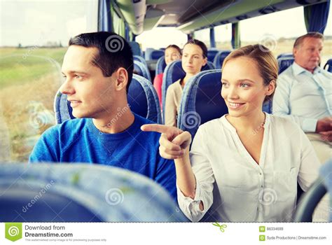 Happy Couple Or Passengers In Travel Bus Stock Image Image Of Coach