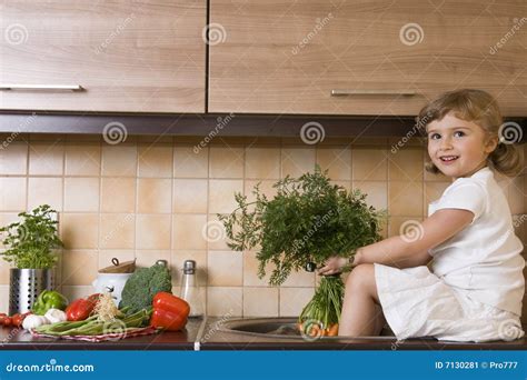 Smiling Girl Helping In Kitchen Stock Image Image Of Green Ripe