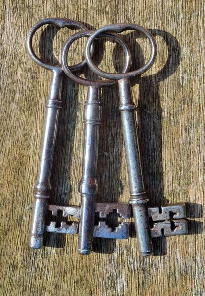 Three Antique Keys On Rustic Wood Stock Image Everypixel