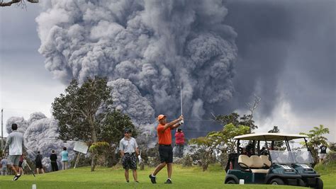 People Play Golf In Hawaii With Volcano Ash Plumes In Distance