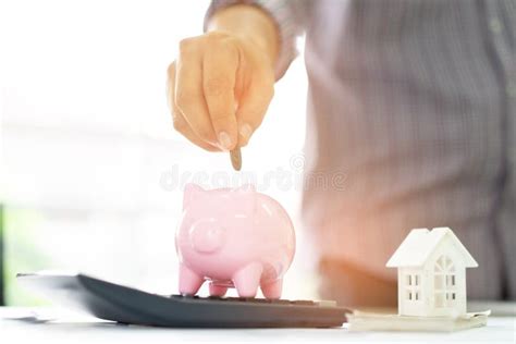Hand Putting Coin Money To Piggy Bank Saving Save Money Concept Stock