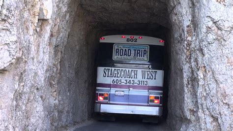 Bus Drives Through Extremely Narrow Rock Tunnel Canvids