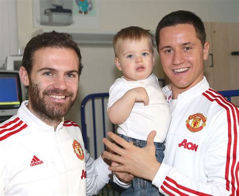 Man United Players Hand Out Christmas Presents At Royal Manchester