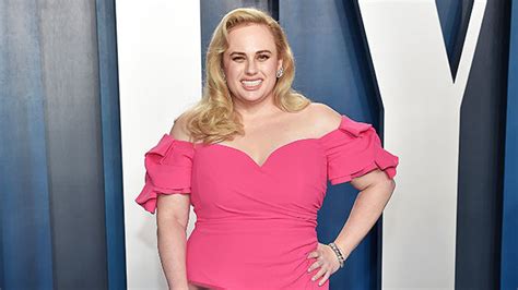 Rebel Wilson Has A Cheat Meal While Rocking Pink Dress See Photo