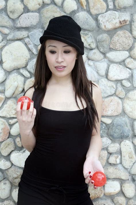 beautiful asian girl juggling two balls stock image image of beauty gorgeous 9175089