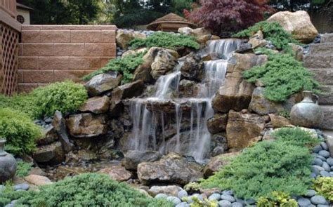 21 Waterfall Ideas To Add Tranquility To Rock Garden Design
