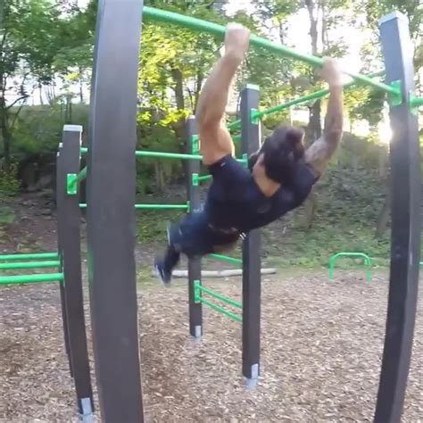 Man Impressively Swings On Bars At The Park Jukin Licensing
