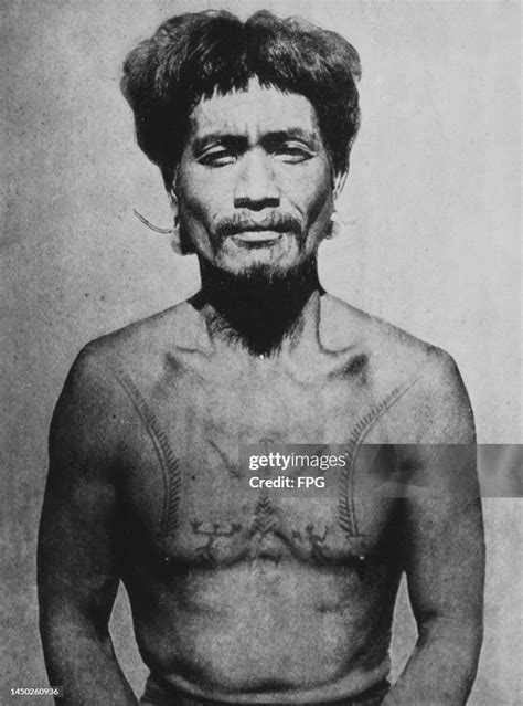 An Igorot Man With A Tattooed Torso Philippines Circa 1915 The