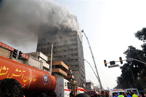 Video Iran Firefighters Killed As High Rise Collapses In Tehran