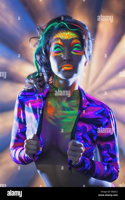 Portrait Of Attractive Woman With Uv Disco Make Up Stock Photo Alamy