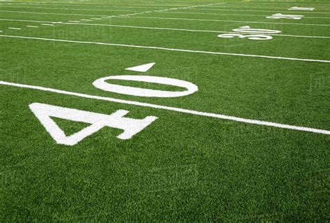 The yard line in football is a line on the field that denotes a single yard in length. Football Yard / Football Field Marking Of 40 Yard Line ...