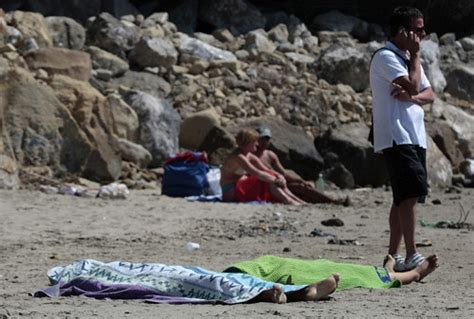 Indifferent Holidaymakers Sunbathe Next To Dead Roma Girls