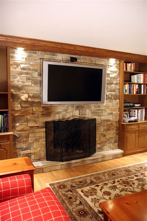 I have this tv mounted about my fireplace and use a special mount that extends out and down. Fireplace Picture Gallery - North Star Stone | Brick ...