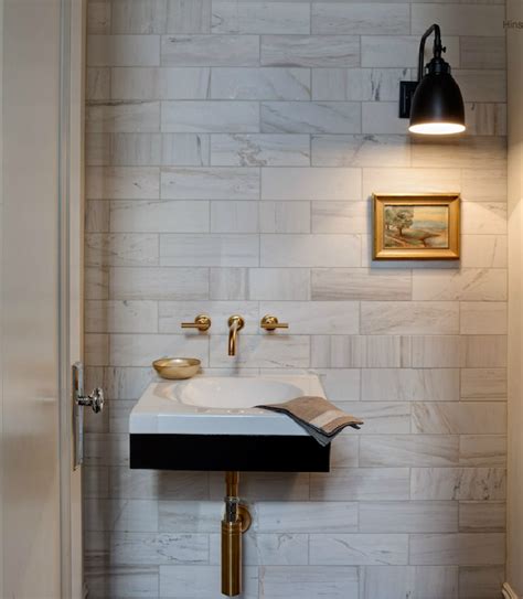 Beautiful Powder Room With Marble Subway Tile Backsplash And Modern