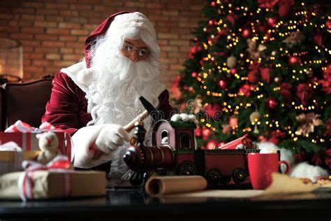 Santa Claus Making New Toy For Christmas Stock Image Image Of