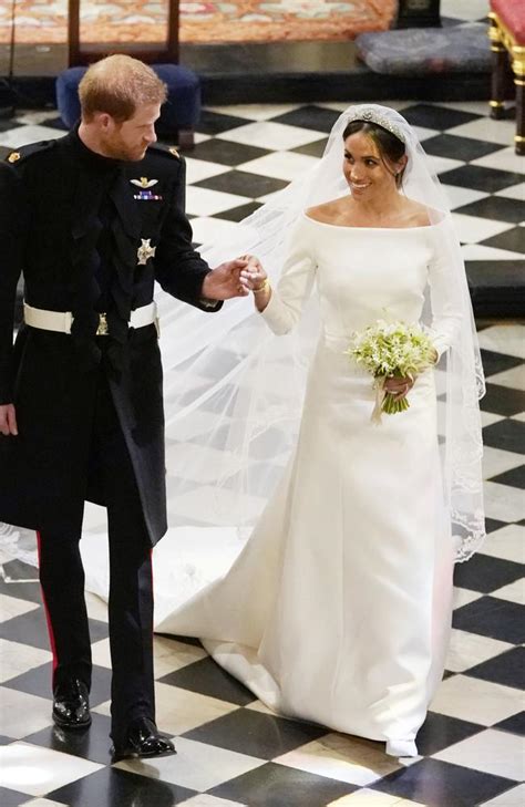 10 things you missed about meghan markle's wedding dresses. Meghan Markle dress slammed: 'Plain and boring' | The Mercury