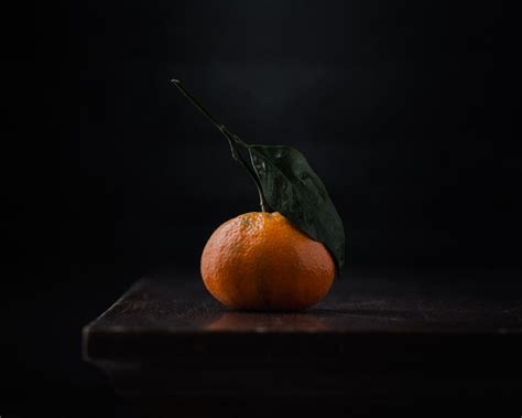 Orange Fruit On Black Surface Photo Free Fruit Image On Unsplash