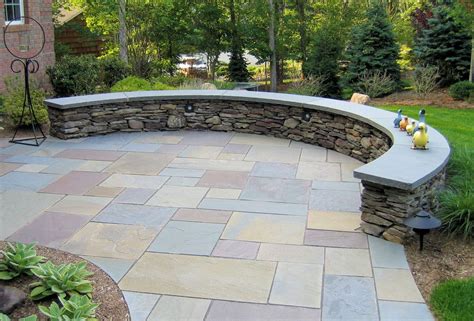 A Sense Of Space Is Created By Curved Pennsylvania Fieldstone Seat Wall