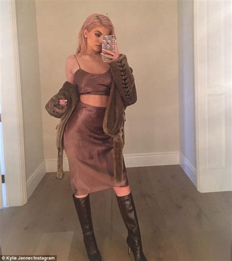 Kylie Jenner Flashes Her Toned Tummy In A Skimpy Satin Crop Top In