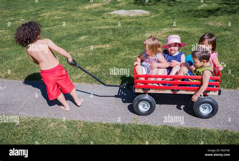 Boy Pulling Wagon Hi Res Stock Photography And Images Alamy