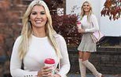 Christine Mcguinness Puts On Leggy Display In Knee High Boots And Mini