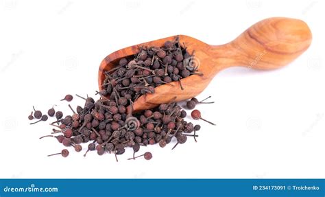 Bourbon Pepper In Wooden Scoop Isolated On White Background Voatsiperifery Or Bourbonese Piper