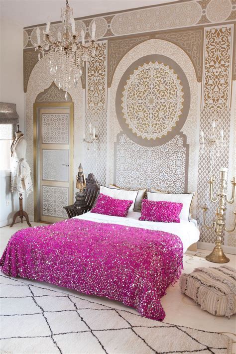 bright fuchsia pink bed cover does all the magic in this white bedroom moroccan decor bedroom