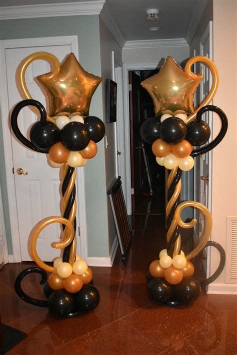 Gold Stars For This Grad Black And Gold Balloon Columns Created For A