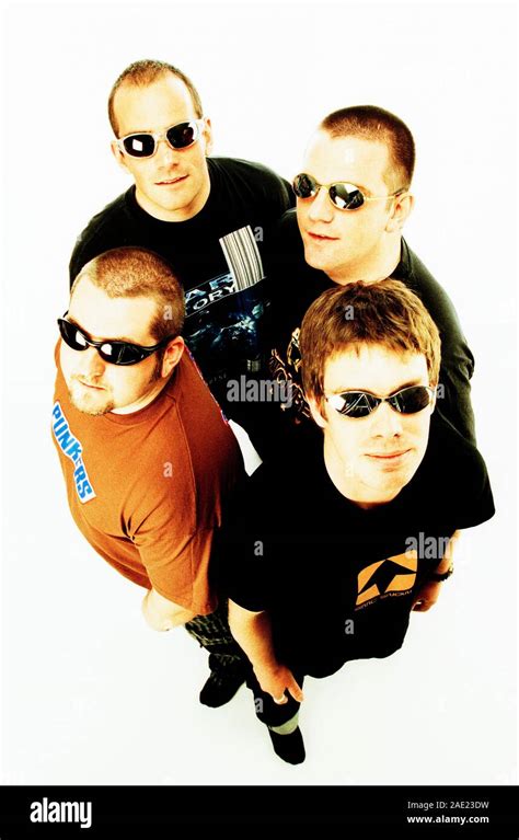 Studio Image From High Viewpoint Of Four Young Men Stock Photo Alamy
