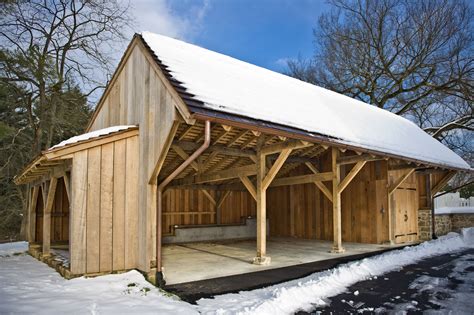 timber framed carriage shed with firewood storage timber framing barns sheds shed plans