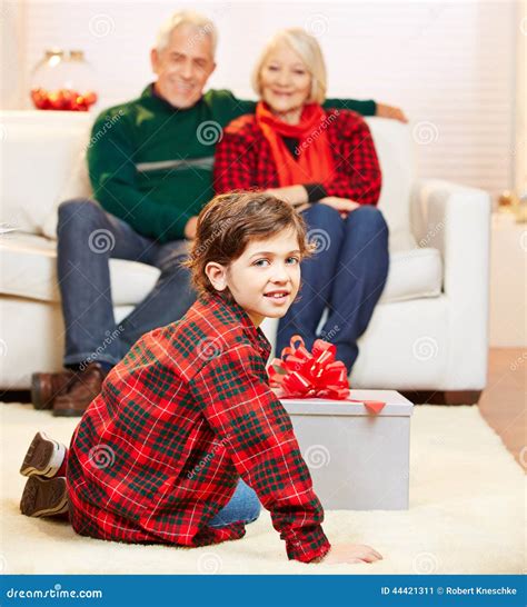 Grandchild Opening T At Stock Image Image Of Christmas 44421311