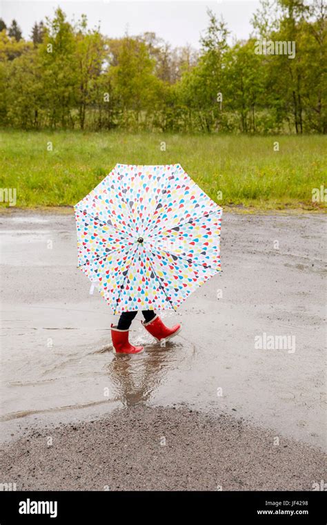 Walking Through Puddle Hi Res Stock Photography And Images Alamy