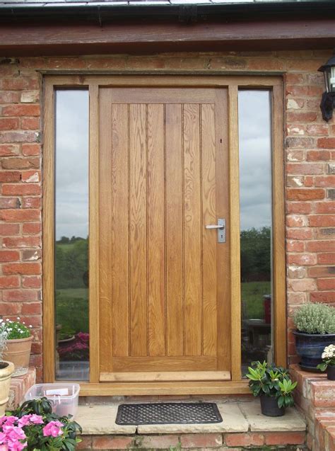Exceptional oak coloured composite doors, made to measure for your home. solid oak front door with side lights,oak door,bespoke ...