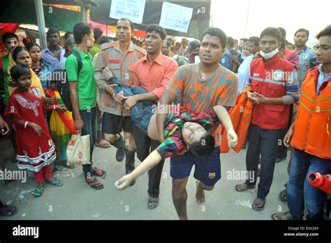dhaka bangladesh 22nd feb 2015 rescuers carry a body of a victim after a ferry accident on