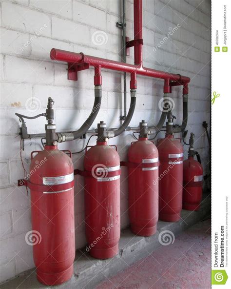 The handheld fire extinguisher is designed to fight small flames caused by flammable solids, liquids, gases and electrical fires. Halon 1301 Cylinders. Fire Extinguisher System Stock Photo ...