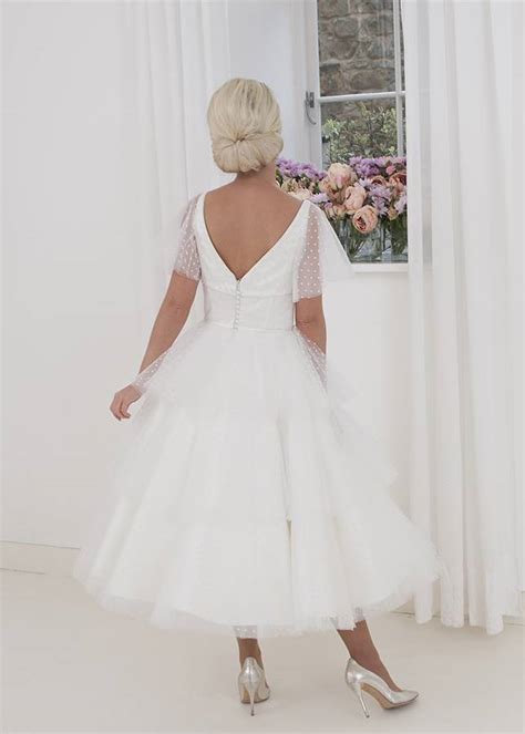 Spot Tulle Ballerina Length Wedding Dress With A V Neck And Flutter Sleeves