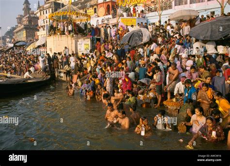 pilgrims at the dasaswamedth ghat by the river ganges at varanasi during the kartik purnima