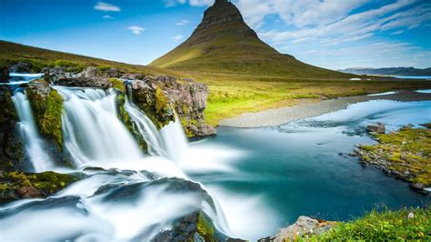 Kirkjufell Mountain Waterfalls With Its Mountains And Magnificent