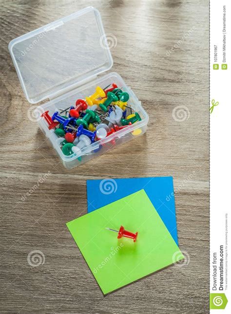 Reminder Notes Drawing Pins In Plastic Container On Wooden Board Stock