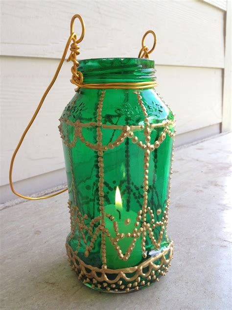 Homemade moroccan lanterns are an attractive and inexpensive addition to a themed home makeover. Moroccan-Inspired Painted Jar Lantern DIY = #jar #lantern ...