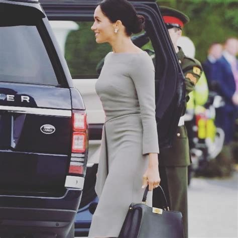 a grey dress by friend roland mouret sparkly earrings by birks and a new bag by fendi kicked