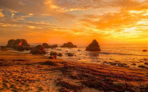Sunset Sea Beach Ocean Waves Rocks Orange Sky Wallpaper Hd